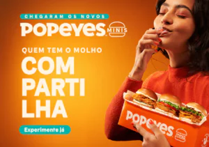 Popeyes Minis: 3 sanduíches e desconto nas letras miúdas Popeyes lança os Minis com campanha que transforma letras miúdas em desconto de 50% para duplas de amigos.